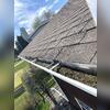 Observing significant debris buildup in the gutters indicates that this gutter system is an ideal candidate for a new gutter guard system. We recommend using RainDrop or Gutter Shutter to address this issue.