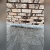 The asphalt is compermised around the chimney's flashing. We will take care of this issue along with the other issues,