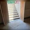TrenchDrain is installed in front of the basement door that leads outside to catch excess and surface water. It is connected to the WaterGuard drainage system.