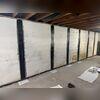 CarbonArmor straps provide permanent stabilization to this foundation wall, preventing further movement and restoring structural integrity.