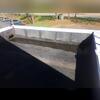 This issue is causing water to penetrate the membrane and has made its way through the underlayment, and is leaking into the interior of the business.