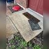 Before the repair was made, there was a large gap between the sidewalk and front stoop.