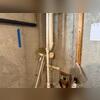 Our System Design Specialists use a laser level to measure the basement for the low spot, helping them properly identify where the new sump pump will be installed.