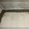 WaterGuard is installed along the perimeter of the basement floor and covered in fresh concrete to provide a seamless finished look. The WaterGuard Port is left visible to provide access to the system when needed.