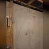 The walls in this basement had a lot of cracks. One of the walls had also begun to lean.