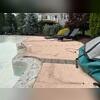 Sunken, uneven concrete around their pool area.