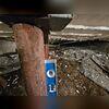 The existing moisture barrier had deteriorated and was no longer effective at preventing groundwater intrusion into the crawl space. Prolonged exposure to moisture resulted in significant corrosion of the lally columns, compromising their structural integrity and load-bearing capacity...