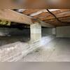 You can see the moisture issues and outdated materials in this South Amboy, NJ crawl space.