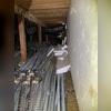 Using filthy crawl space as storage