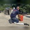 Injecting the PolyLevel foam under the concrete.