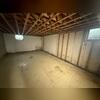 This shot gives you a great view of what this basement was like before Fortress installed our solutions.