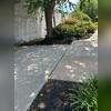 The sunken concrete slabs caused worry over potential tripping hazards and water drainage issues.