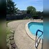 The concrete slabs around their pool were uneven.
