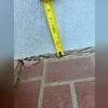 Before using PolyLevel to lift the front porch, there was almost an inch difference in height between the two slabs.