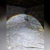 The existing crawl space moisture barrier was found to be inadequate due to its thin, low-durability material, which exhibited multiple tears and failed to effectively prevent moisture intrusion. As a result, a more robust encapsulation solution was necessary to protect the crawl space environment...