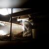 A team member working to first clean out the space.