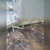 The cabin was sinking into the damp, loose soil beneath, causing damage to the structural integrity of the home.