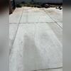 A long concrete crack extending across a backyard pool patio before receiving professional concrete crack repair, concrete leveling, and NexusPro joint sealing in Cherry Valley, California.