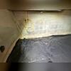 During our inspection of the crawl space moisture dame can be seen. Water is seeping out of the bottom of the concrete block walls. The vapor barrier that is in place is not controlling the moisture issues.