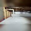 The insulation is installed directly on the crawl space walls for maximum thermal protection.