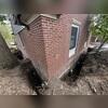 A total of 26 helical piers were installed around the home's foundation to provide deep, permanent support. These piers transfer the weight of the structure to stable load-bearing soils, helping to stabilize the foundation and prevent further settlement.