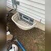 The crew expanded the window well depth to properly drain water and protect the basement from leaks.
