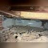 Heavy-duty seismic foundation connectors were installed to securely fasten the home's wood framing to the foundation, improving structural strength and earthquake resistance.