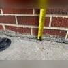 This sidewalk should sit about an inch higher.