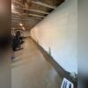 This fully installed system ensures water is directed to the sump pump, preventing damage.