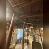 The existing support system was inadequate for the structural loads being carried by the floor framing above the basement. Over time, insufficient support allowed the main beam and floor joists to deflect, resulting in noticeable sagging and excessive floor movement. To restore proper load transfer...