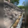 The gutters are loaded with debris and need a gutter guard system installed.
