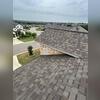 A newly completed repair with architectural roof shingles on Sugarcane Drive in New Braunfels, TX.