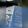 Our crew installing a new standing seam metal roof on this Comfort, TX home.