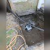 Helical piers are designed to permanently stabilize settling foundations by transferring the home's weight below unstable surface soils to stronger load-bearing ground.
