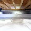 SilverGlo is a vapor barrier that is placed on the walls that reflects heat back into the home during winter and away during summer using a foil facing.