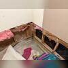 Water intrusion was discovered under basement carpets. A quick attempt to soak up water with towels was made by homeowners.