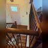 We replaced the original staircase with a modern wooden 2-story staircase. Michael was overly impressed with the results.