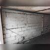 This wall was unstable and the cracks and bowing were solid proof that something needed to be done and fast. Stair step cracks and a wall protruding outwards are red flags that need to be addressed before something serious like a wall collapsing occurs.