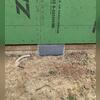 A heavy-duty plastic vent cover is installed over the opening to prevent the entry of unwanted guests and seal off the crawl space from the outside.