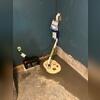 The crew installed a sump pump in the basement to drain out moisture beneath the slab.
