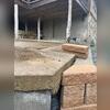 The settling concrete created noticeable height differences between sections of the driveway, resulting in trip hazards and an unstable surface.