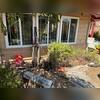 Specialized hydraulic equipment is positioned beside this Fallbrook home during foundation pier installation. Saber used both push piers and helical piers as part of the foundation stabilization plan for this Southern California property.