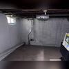 2" closed cell spray foam applied to the foundation walls and covered with fire resistant paint.