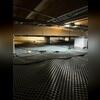 Drainage matting forms a permanent seal for leaking crawl space floors.