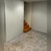 Discolored or damp basement carpeting is often a clear warning sign of ground moisture migrating through the concrete slab.