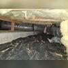 This musty crawl space was accumulating water and mold as the years went on, and the thin flimsy liner didn't help.