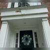 Rotted portico trim and peeling paint from moisture damage