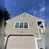 See how we solved severe siding peeling and roofline accessibility challenges for this Newtown, CT home with a complete exterior repaint and trim refresh.