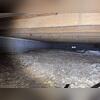 This dirt crawl space was a pain point for the owners. They noticed a lot of moisture was getting in there and wanted to get it out.