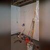 Here you can see our TripleSafe Sump Pump being installed in the basement. Our WaterGuard System ties into the sump pump and works together to move water out of the basement.